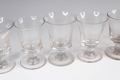 Lot 4093 - A matched set of eight Georgian glass rummers,...
