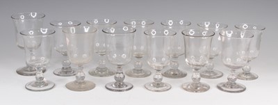 Lot 4089 - A matched set of twelve Georgian glass rummers,...