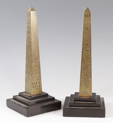 Lot 4253 - A pair of Egyptian Revival brass obelisk, each...