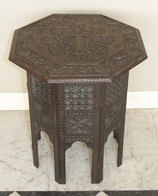 Lot 4526 - A circa 1900 Indian stained and relief carved...