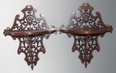 Lot 4467 - A pair of Edwardian mahogany fret-cut wall...