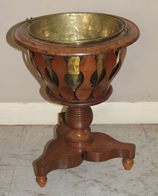 Lot 4372 - A 19th century mahogany circular jardiniere...