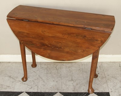 Lot 4400 - An 18th century provincial yew wood dropleaf...