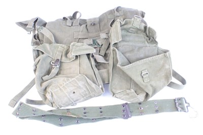 Lot 611 - A kit bag containing various webbing pouches...