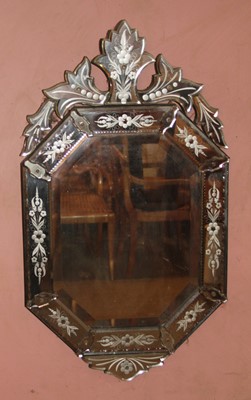 Lot 4486 - A Venetian octagonal bevelled wall mirror,...