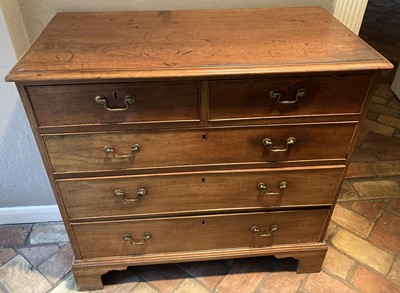 Lot 4474 - A George III mahogany squarefront chest of two...