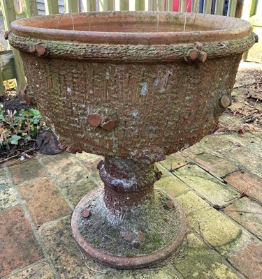 Lot 4542 - An unusual terracotta circular footed garden...