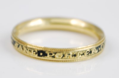 Lot 2301 - A 19th century yellow metal memorial ring...