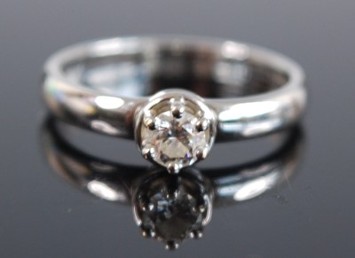 Lot 2558 - A white metal diamond solitaire ring,...