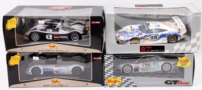 Lot 752 - A collection of 4 various boxed 1/18th scale...