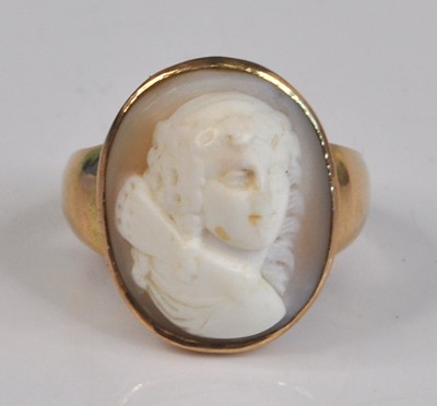 Lot 4150 - A 9ct yellow gold cameo ring, the oval shell...
