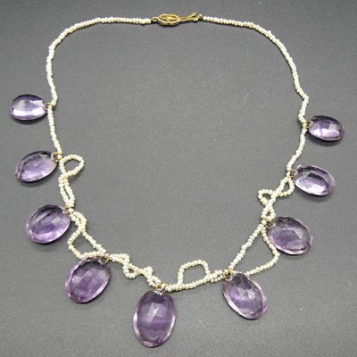 Lot 199 - An early 20th century amethyst and seed pearl...