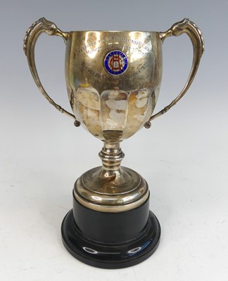 Lot 176 - An Art Deco silver twin-handled pedestal...