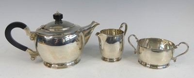 Lot 168 - An Art Deco silver three-piece tea set,...