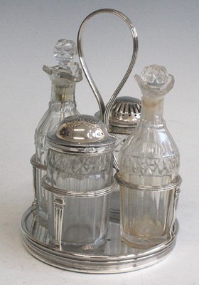 Lot 2263 - A George III silver and cut glass cruet set....