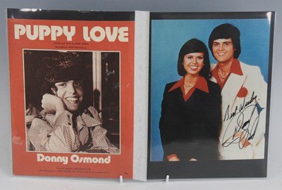 Lot 1150 - Donny Osmond, a 24.5 x 20cm colour photograph...