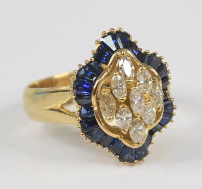 Lot 2370 - An 18ct yellow gold, sapphire and diamond...