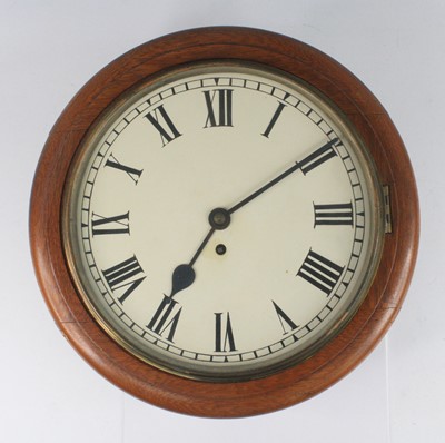 Lot 2643 - A Victorian oak cased wall clock, having a...