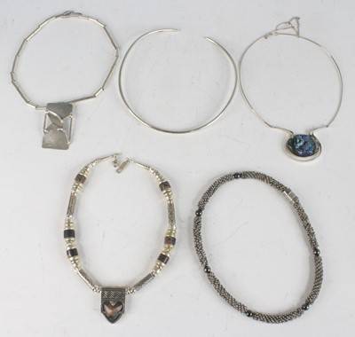 Lot 208 - A modern silver necklace, of plain circular...