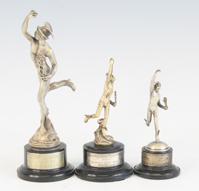 Lot 1257 - A collection of three 1930's pewter trophies,...