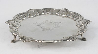 Lot 2251 - A George II silver card waiter, of shaped...