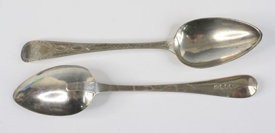 Lot 2265 - A pair of George III silver table spoons. in...