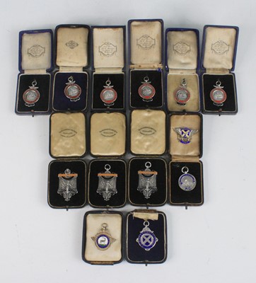 Lot 1260 - A collection of George V silver and enamelled...
