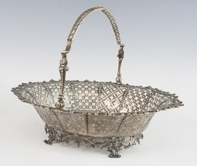 Lot 2257 - A George III openwork silver swing-handled...