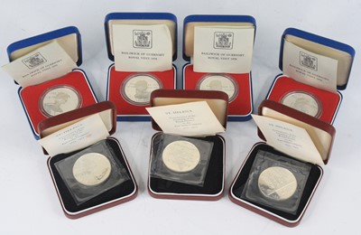 Lot 2066 - A collection of seven silver crowns, to...