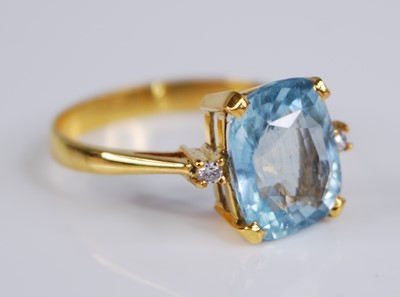 Lot 2365 - A yellow metal aquamarine set dress ring, the...