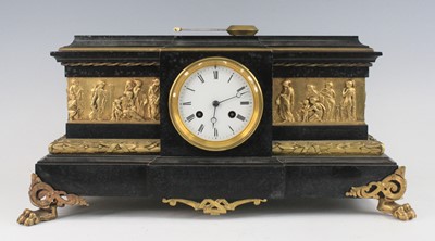 Lot 2649 - A late Victorian polished black slate and gilt...