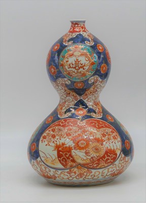 Lot 1 - A Japanese Imari porcelain vase, of double...