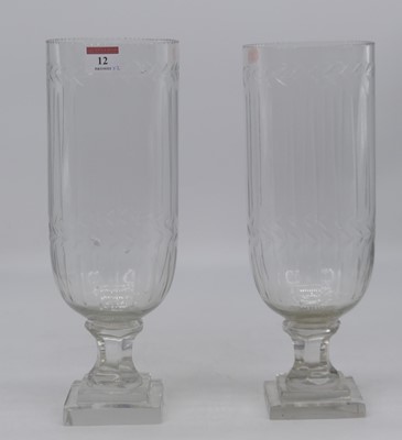 Lot 12 - A pair of modern cut glass hurricane lamps,...