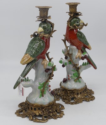 Lot 15 - A pair of continental porcelain and gilt metal...