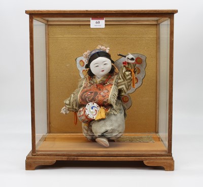 Lot 60 - A Japanese doll, in a glazed display case,...