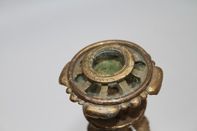 Lot 73 - A 19th century brass oil lamp base in the form...