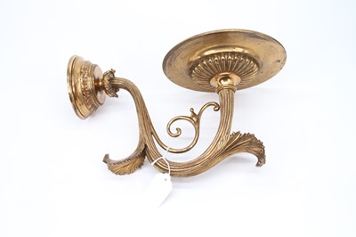 Lot 74 - A 19th century gilt metal wall sconce, with...