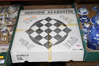 Lot 81 - A polished alabaster chess set, boxed