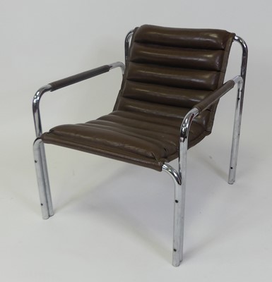 Lot 526 - A contemporary tubular chrome and tan leather...