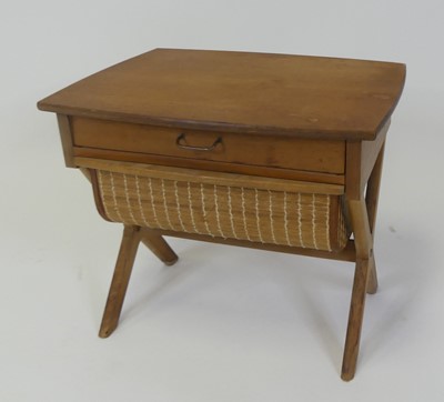 Lot 461 - A 1960s teak low sewing table, with single...