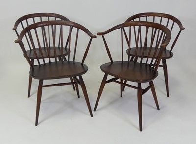 Lot 438 - A set of four 1960s Ercol dark elm Model 338...