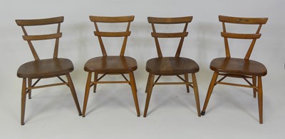 Lot 446 - A collection of four 1960s Ercol blond elm...