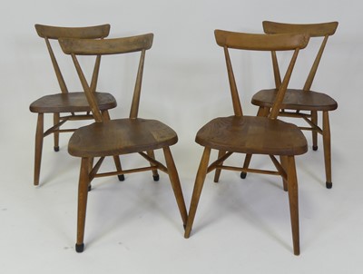 Lot 444 - A set of four 1960s Ercol blond elm child's...