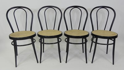 Lot 516 - A set of four black painted tubular metal cafe...