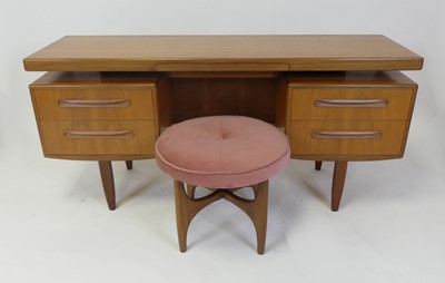 Lot 476 - A 1960s G-Plan teak Fresco long kneehole...