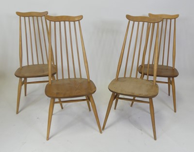 Lot 451 - A set of four Ercol light elm stickback...