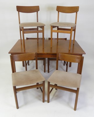 Lot 483 - A 1960s teak extending dining table by White &...