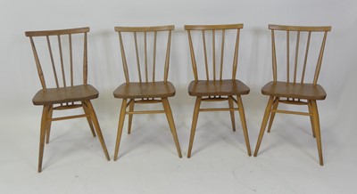 Lot 452 - A set of four 1960s Ercol model 391 blond elm...