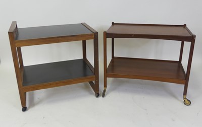 Lot 466 - A 1960s teak and black formica inset two-tier...