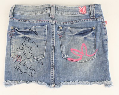 Lot 1222 - Elke Jeinsen, a blue denim Playboy skirt,...